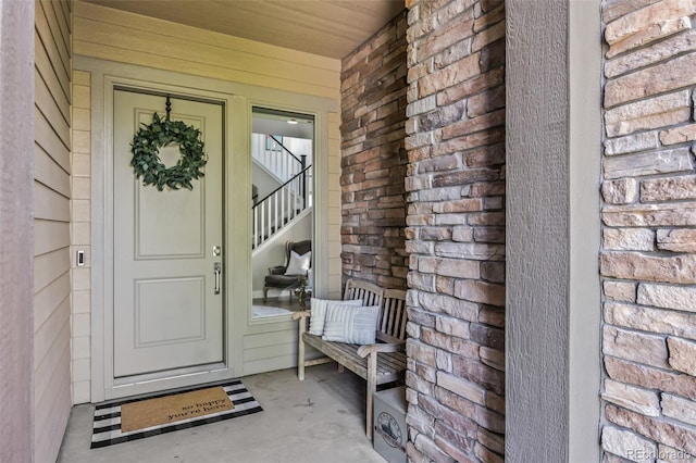 10401 Maplebrook Way, Highlands Ranch, CO 80126 - property entrance with brick siding and covered porch