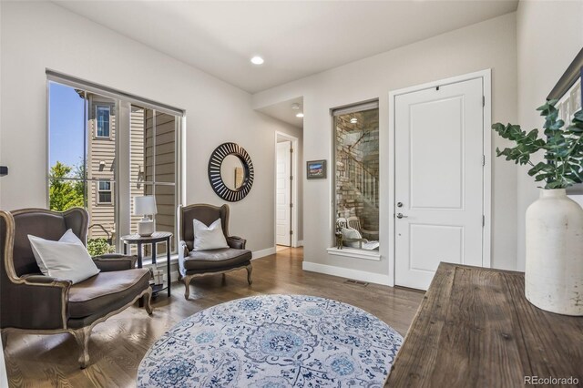 10401 Maplebrook Way, Highlands Ranch, CO 80126 - living area featuring wood finished floors and recessed lighting