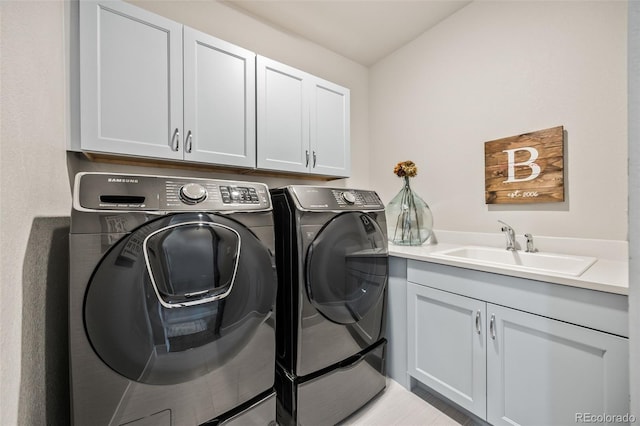10401 Maplebrook Way, Highlands Ranch, CO 80126 - washroom featuring cabinet space and washing machine and clothes dryer