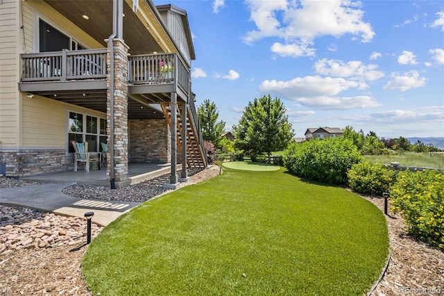 10401 Maplebrook Way, Highlands Ranch, CO 80126 - view of grassy yard with a patio, stairs, and a deck