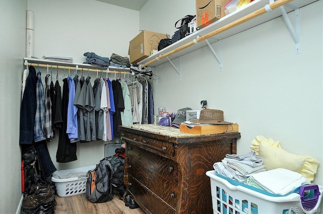 spacious closet featuring wood finished floors