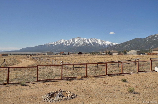 view of mountain feature with a rural view