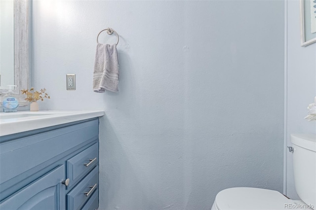 4676 S Dillon Ct Unit G, Aurora, CO 80015 - bathroom featuring toilet and vanity