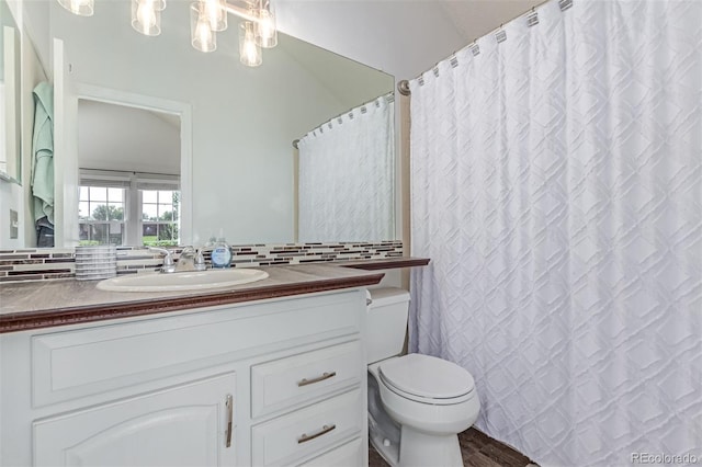 4676 S Dillon Ct Unit G, Aurora, CO 80015 - full bathroom with vanity and decorative backsplash