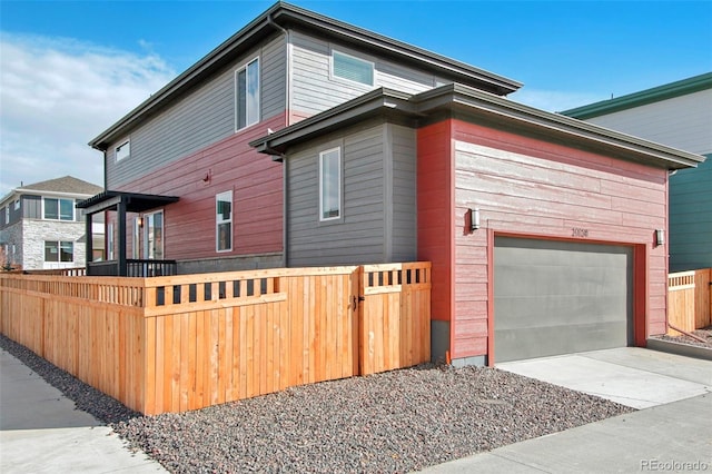 view of property exterior with a garage