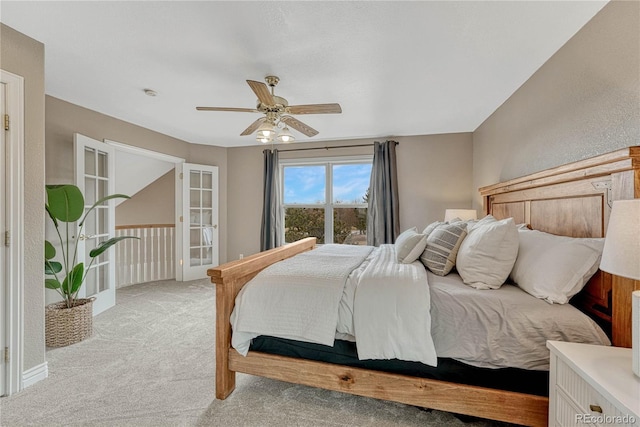 bedroom with light carpet and ceiling fan