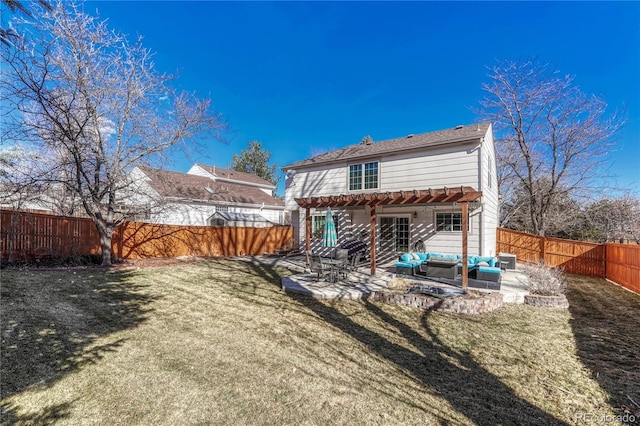 back of house with a patio, outdoor lounge area, a yard, and a pergola