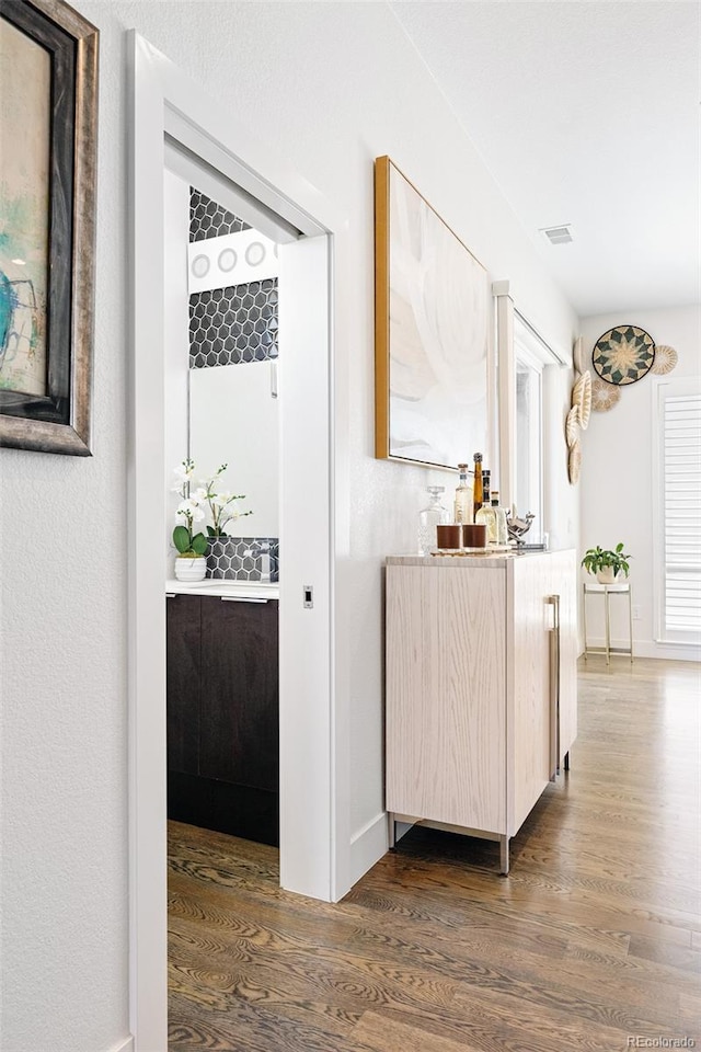 4395 Zuni St, Denver, CO 80211 - hallway featuring dark wood-style floors