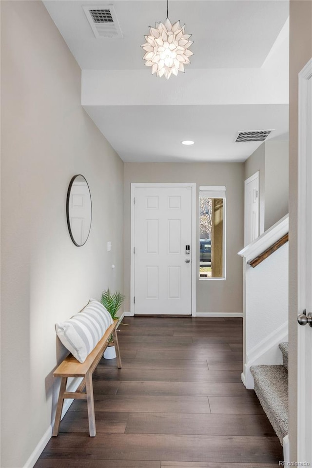 foyer featuring dark wood-type flooring