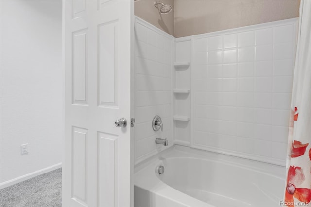 bathroom featuring shower / bathtub combination with curtain