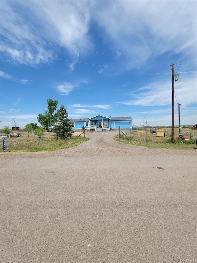 58117 E 42nd Dr, Strasburg, CO 80136 - view of front of home with driveway