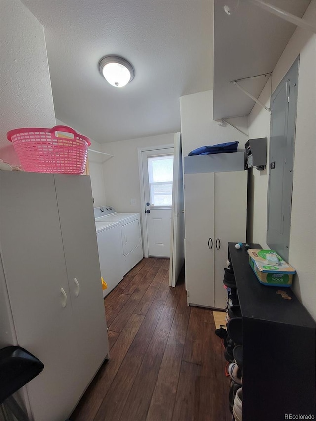 58117 E 42nd Dr, Strasburg, CO 80136 - laundry area with washer and dryer, dark wood-style flooring, and electric panel