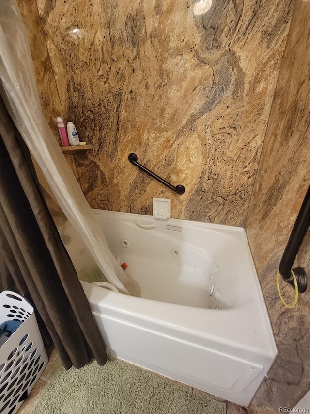 58117 E 42nd Dr, Strasburg, CO 80136 - full bathroom featuring a combined bath / shower with jetted tub