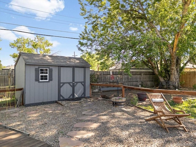 1568 S Osceola Way, Denver, CO 80219 - view of shed with a fenced backyard