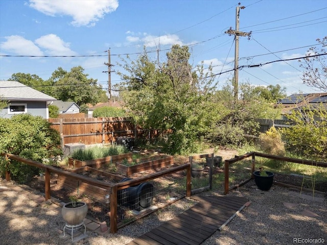 1568 S Osceola Way, Denver, CO 80219 - deck featuring a garden