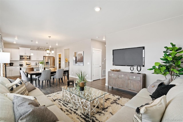 living room featuring dark wood-type flooring