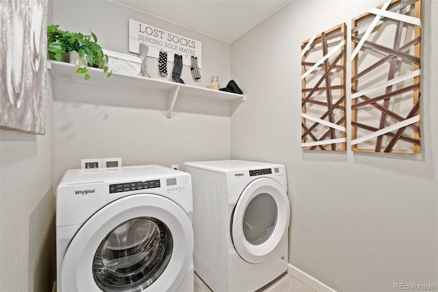 laundry room with washing machine and dryer