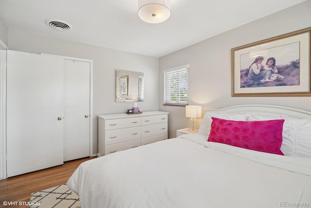 2792 S Stuart St, Denver, CO 80236 - bedroom with light wood finished floors and a closet