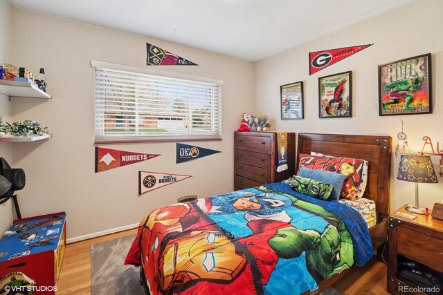 2792 S Stuart St, Denver, CO 80236 - bedroom with wood finished floors and baseboards