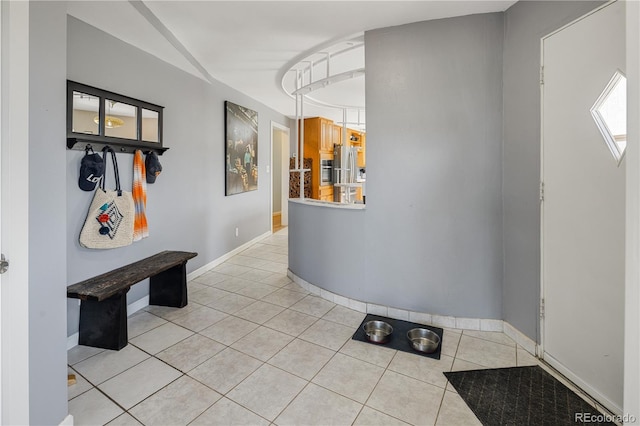 4647 W Dakota Ave, Denver, CO 80219 - corridor with light tile patterned floors