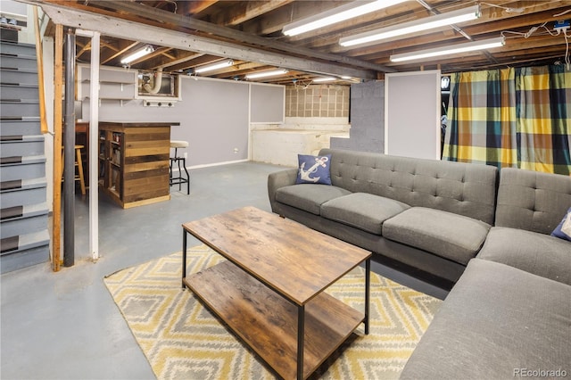 4647 W Dakota Ave, Denver, CO 80219 - living room with finished concrete floors and stairs
