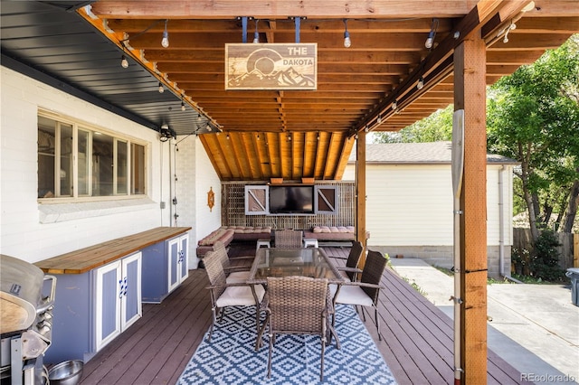 4647 W Dakota Ave, Denver, CO 80219 - wooden deck featuring an outdoor hangout area and area for grilling