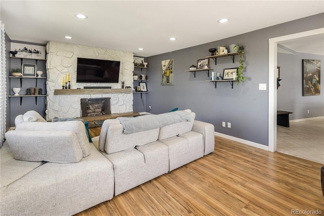4647 W Dakota Ave, Denver, CO 80219 - living area with wood finished floors, a fireplace, and recessed lighting