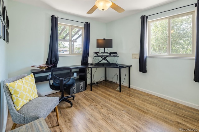 4647 W Dakota Ave, Denver, CO 80219 - home office featuring wood finished floors and a ceiling fan