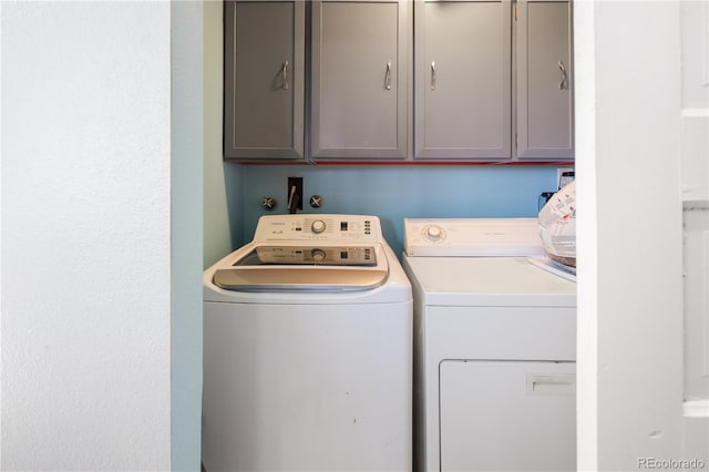 4647 W Dakota Ave, Denver, CO 80219 - washroom featuring independent washer and dryer and cabinet space