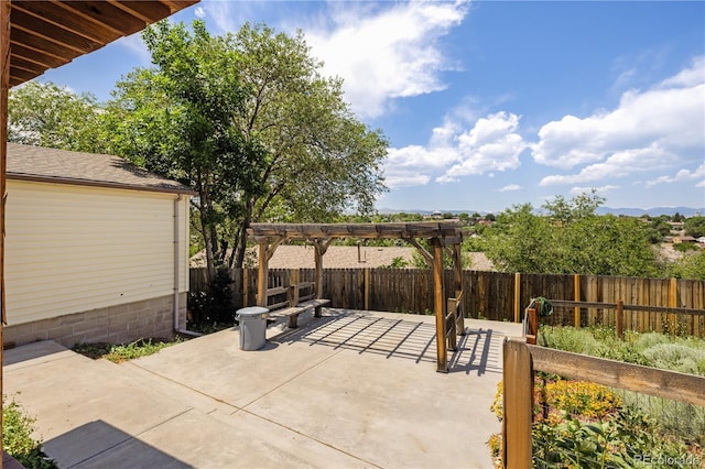 4647 W Dakota Ave, Denver, CO 80219 - fenced backyard with a patio area and a pergola