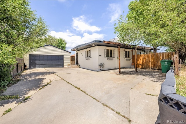 4647 W Dakota Ave, Denver, CO 80219 - view of front of property with an outbuilding and a detached garage