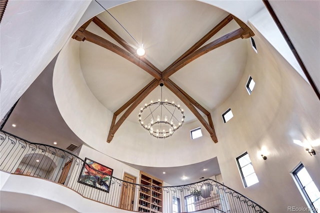 room details featuring recessed lighting, visible vents, and an inviting chandelier