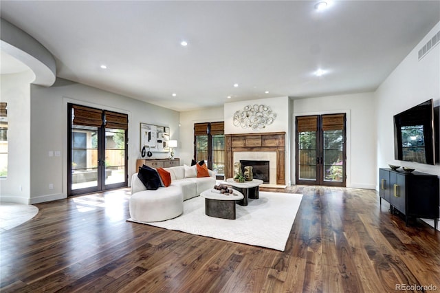 living room featuring french doors and wood finished floors