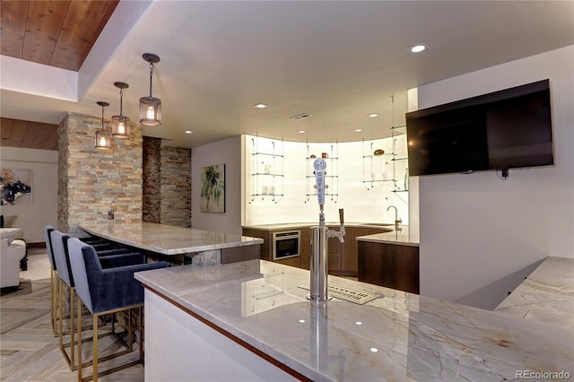 bar with recessed lighting, visible vents, wooden ceiling, a sink, and hanging light fixtures