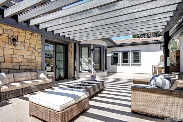 view of patio / terrace featuring a pergola and outdoor lounge area