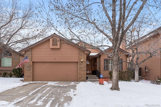 view of front of property featuring a garage