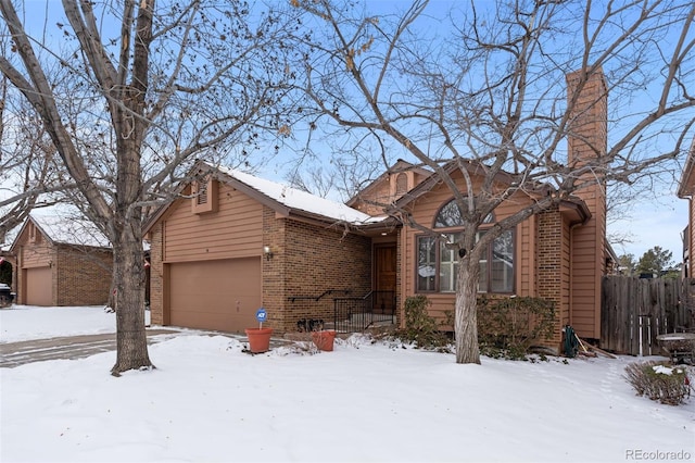 view of front of property with a garage