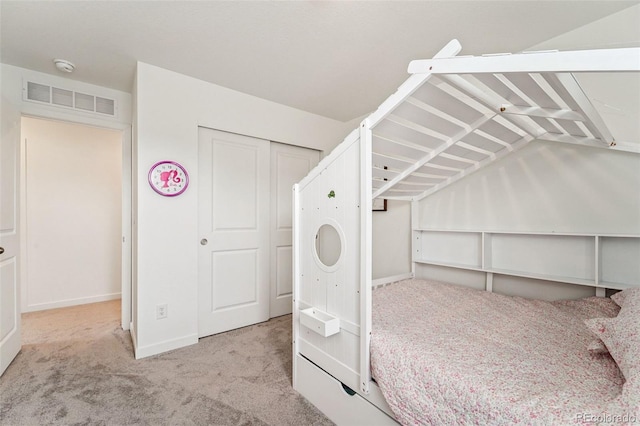 unfurnished bedroom featuring light colored carpet