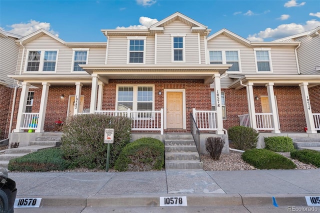 10578 Country Park Pt, Fountain, CO 80817 - view of property featuring a porch and brick siding