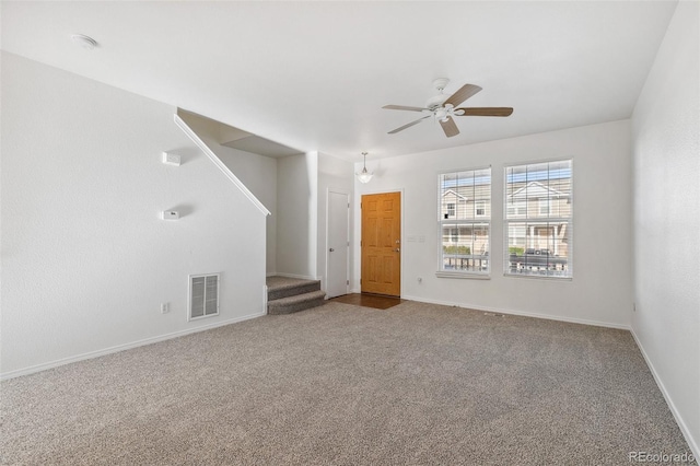 10578 Country Park Pt, Fountain, CO 80817 - carpeted empty room featuring stairs, ceiling fan, baseboards, and a smoke detector
