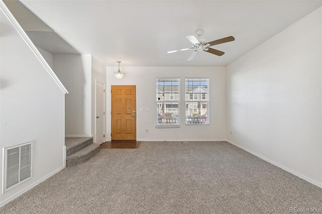10578 Country Park Pt, Fountain, CO 80817 - carpeted foyer featuring ceiling fan and baseboards