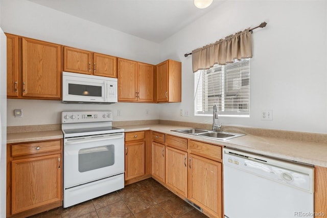 10578 Country Park Pt, Fountain, CO 80817 - kitchen with white appliances, a sink, and light countertops
