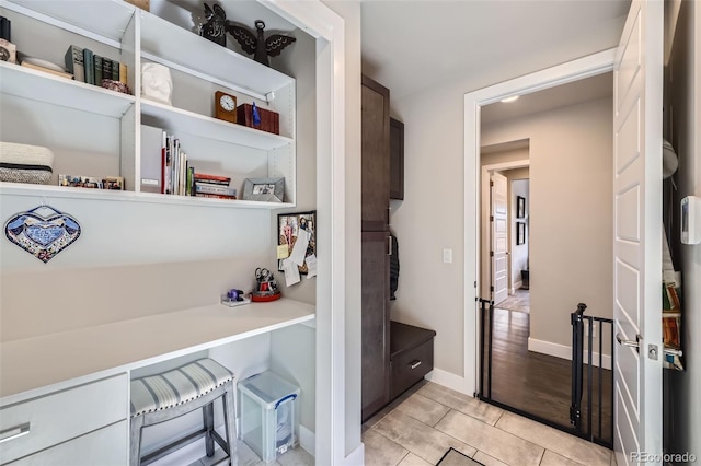 interior space with light tile patterned floors