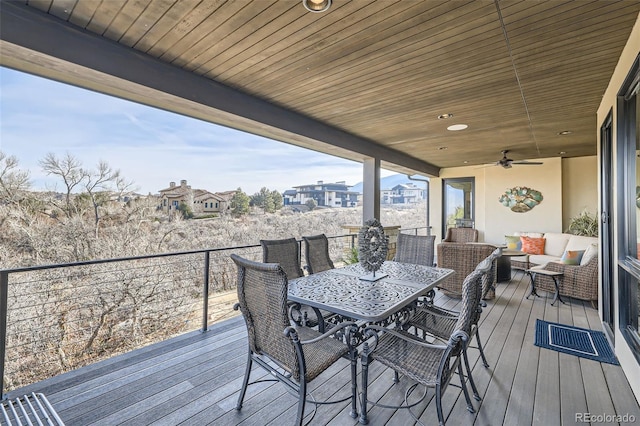 wooden terrace with ceiling fan