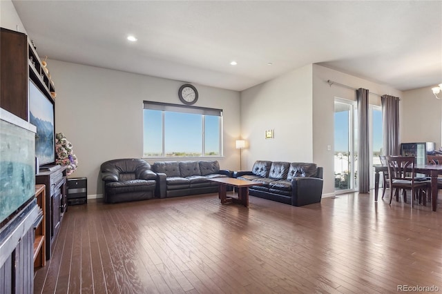 living room featuring dark hardwood / wood-style floors