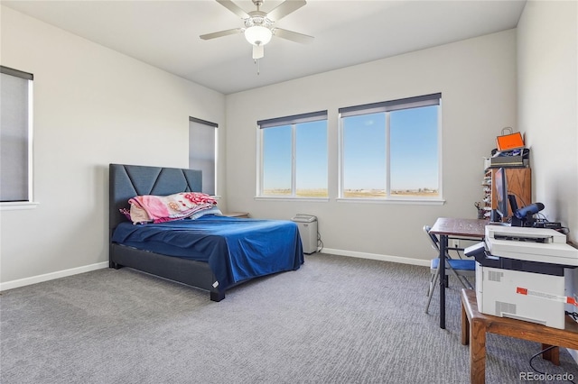 bedroom with ceiling fan and carpet flooring