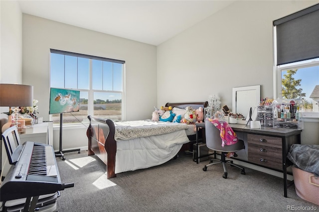 bedroom featuring light colored carpet