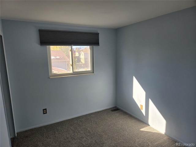 unfurnished room featuring carpet floors