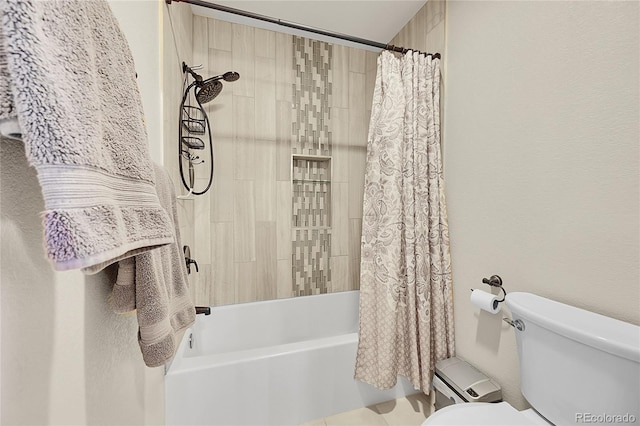 bathroom featuring toilet and shower / bath combo with shower curtain