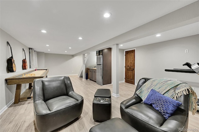 living room with light hardwood / wood-style floors